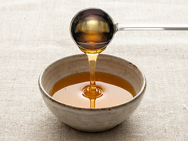 Amber-colored specialty cane syrups in glass containers from U.S. Sugar