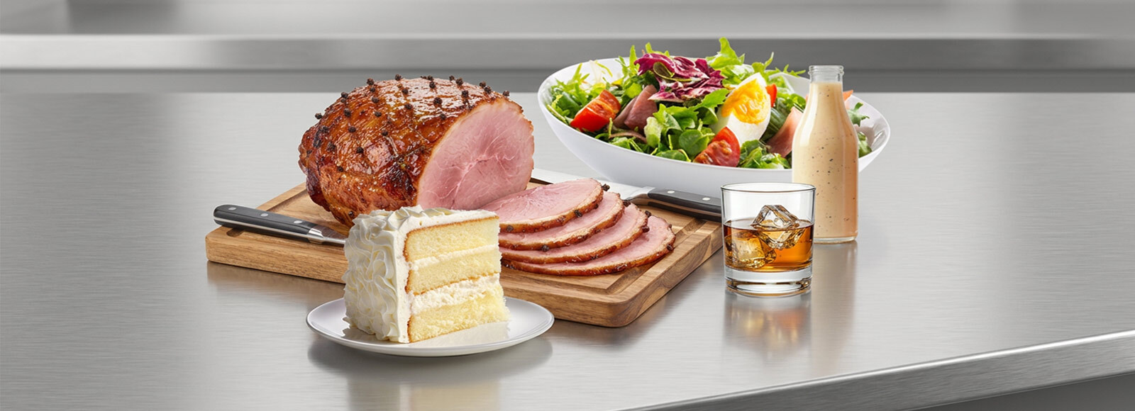 Glazed sliced ham, fresh salad and creamy dressing representing food applications for U.S. Sugar specialty cane sweeteners and molasses.